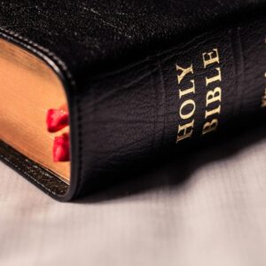 A close-up of the King James Version Bible with leather cover and gold lettering.
